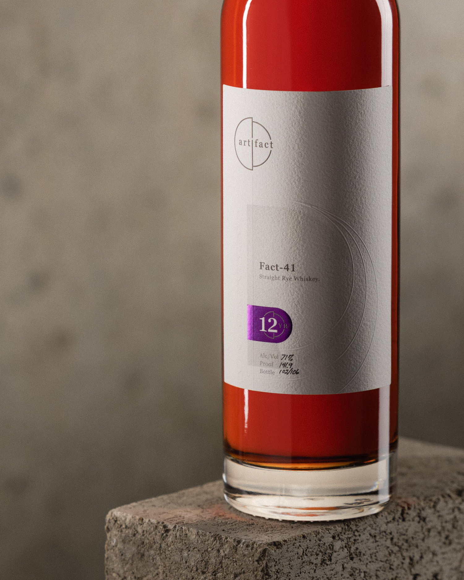 Whiskey bottle with white label